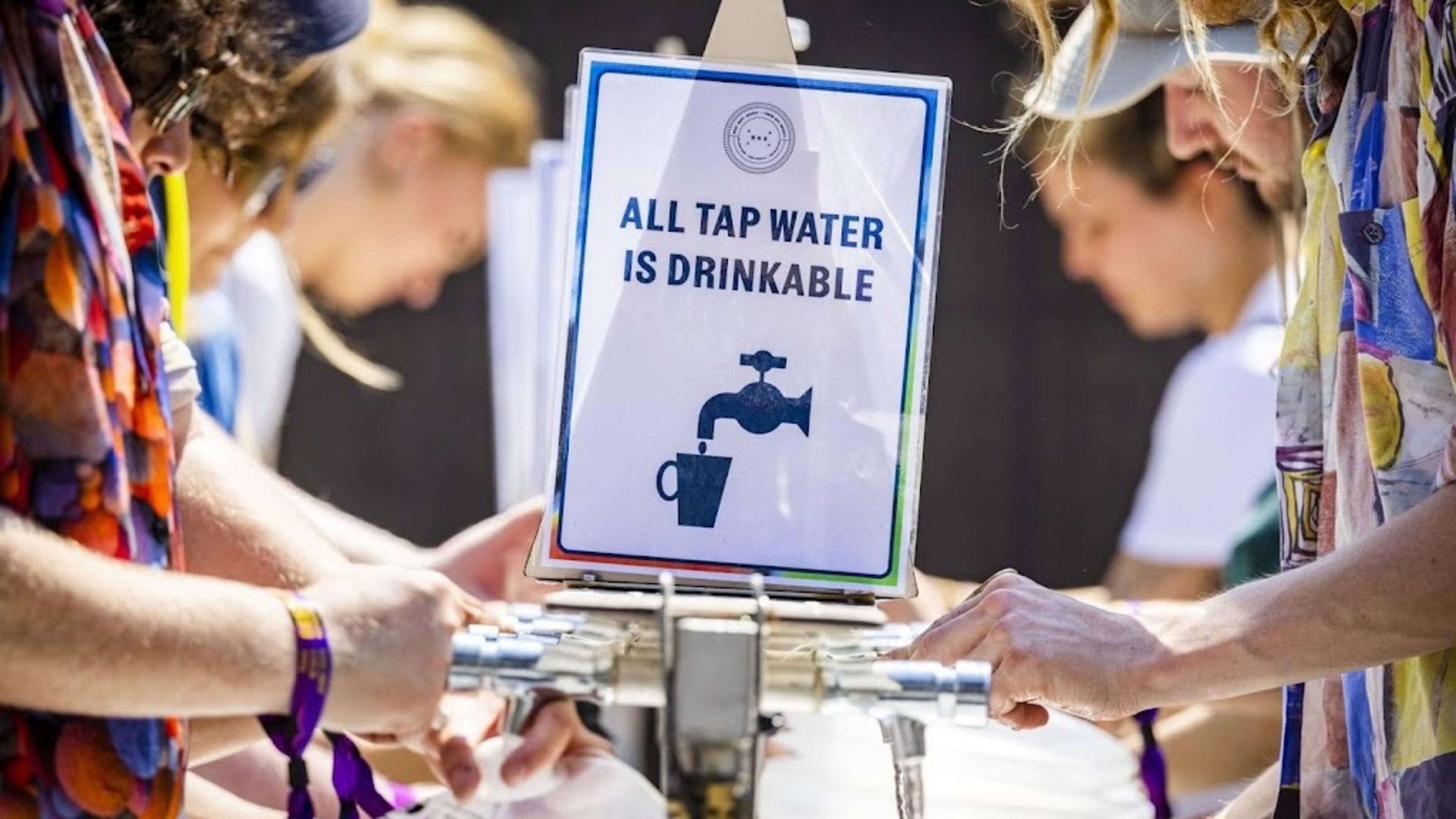 Events set up extra water and sunscreen stations due to heat