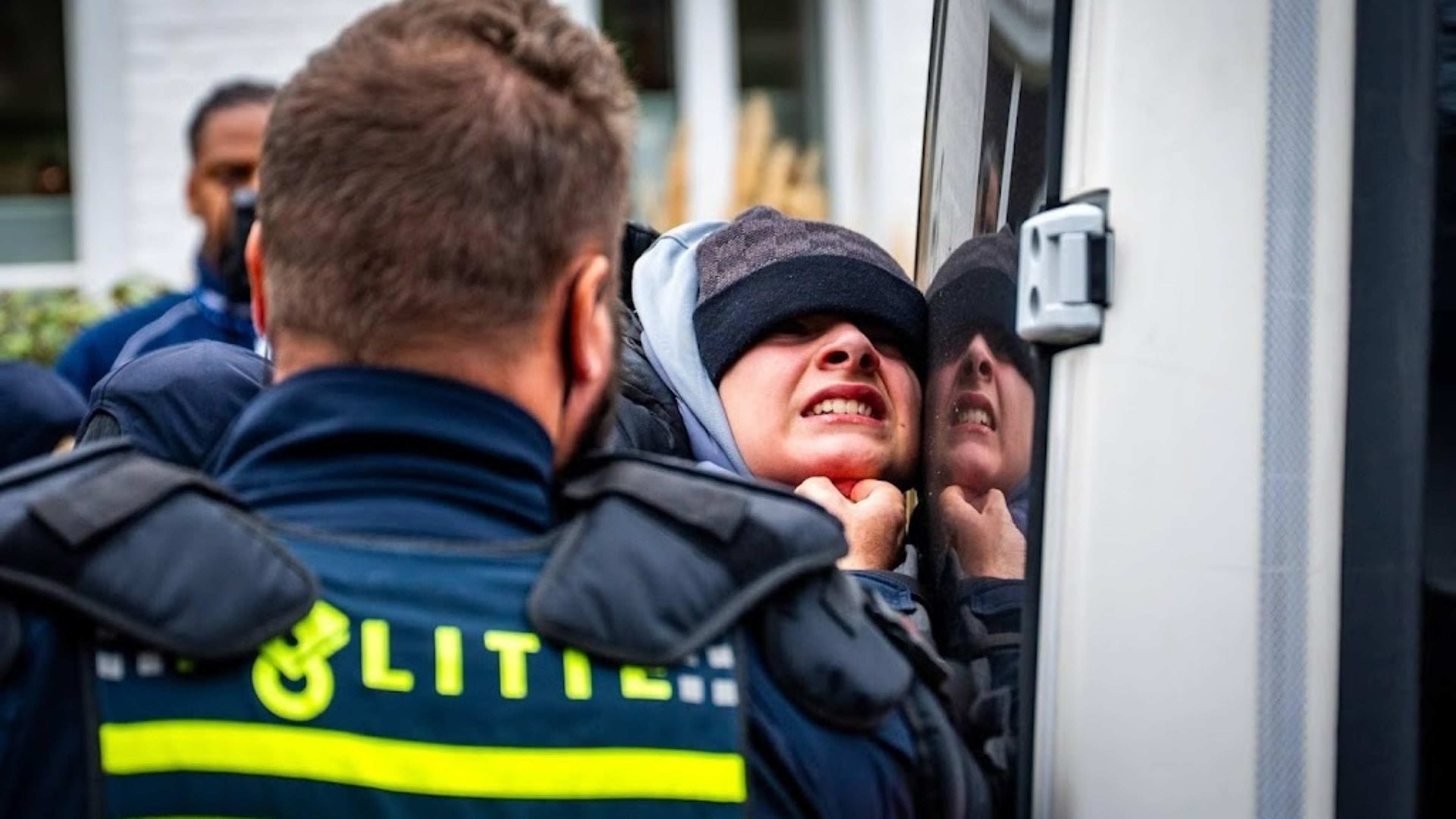 Suspect in assault on officer at The Hague asylum protest still in custody
