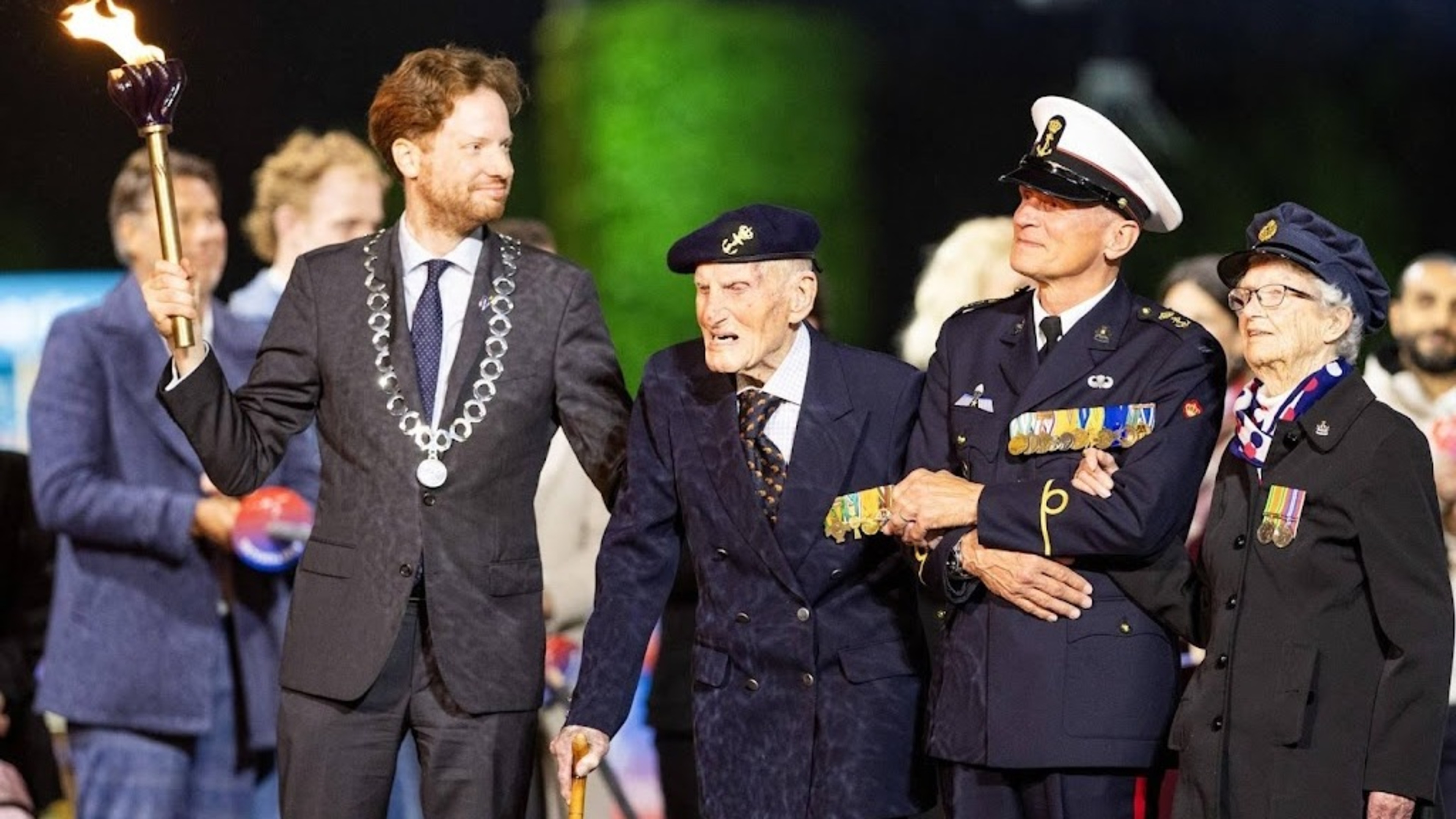 WWII veterans (103 and 105) light liberation flame in Wageningen