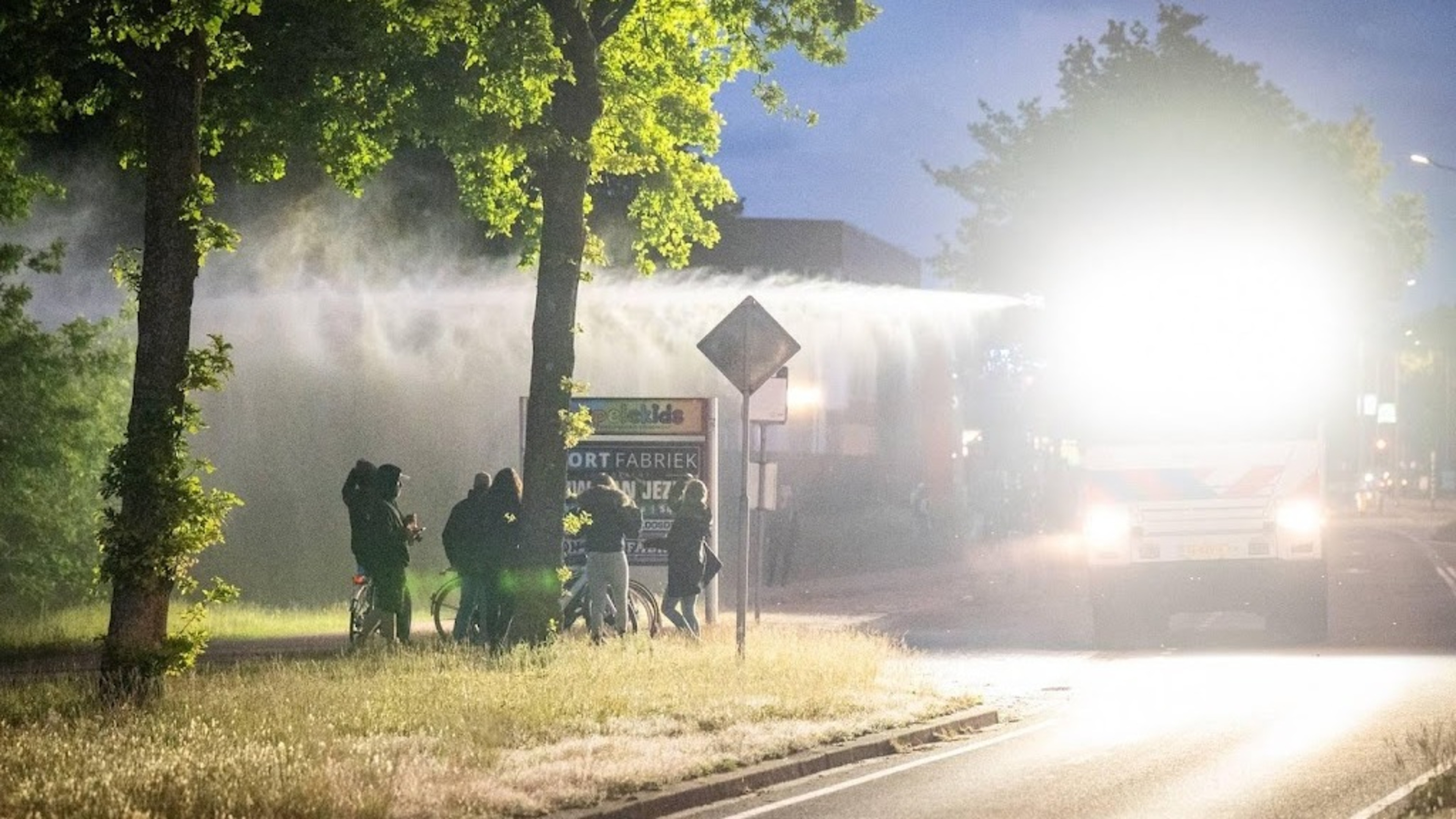 Riot police with water cannon on the scene in Loosdrecht