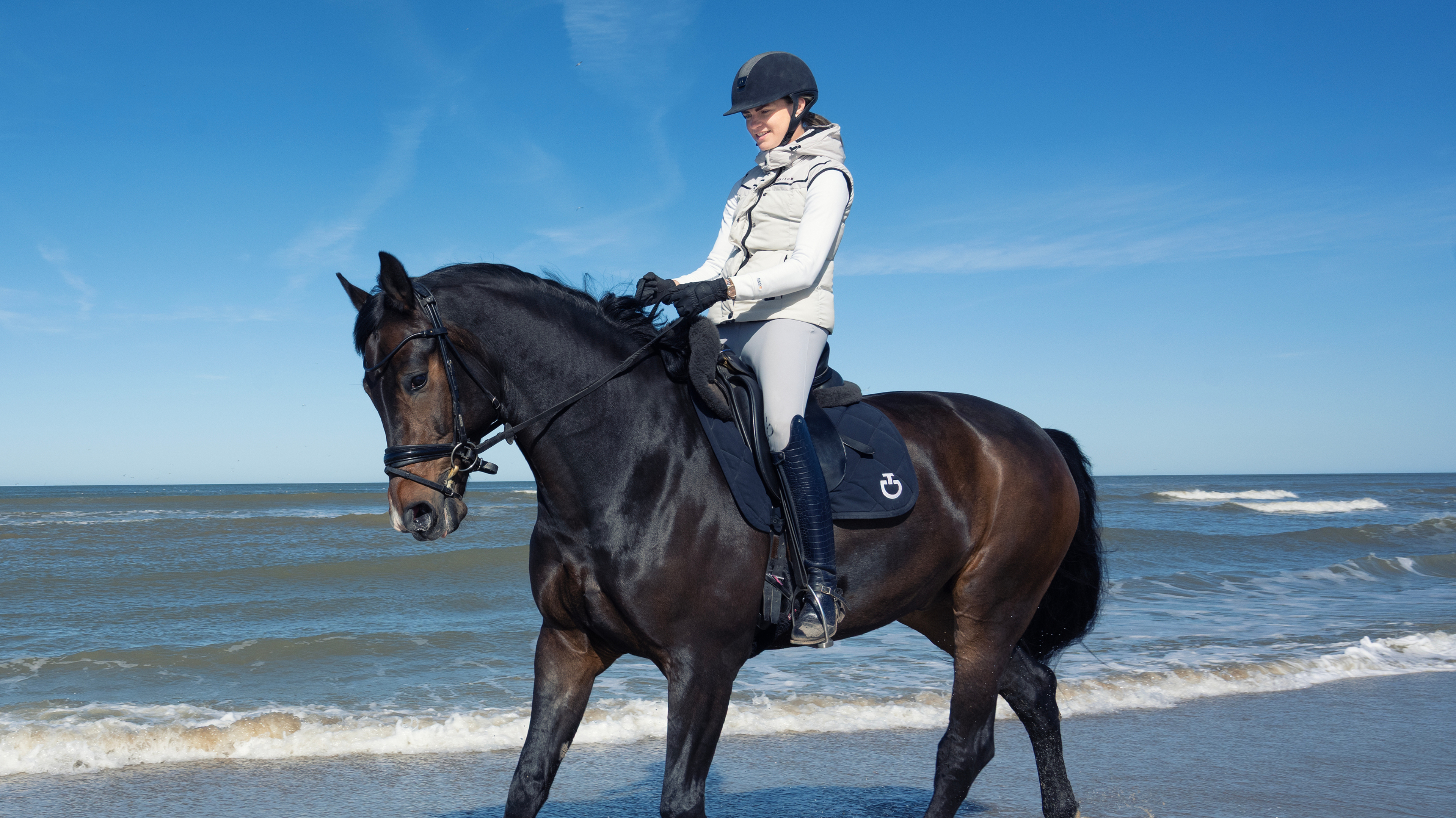 Horse Sergio finds the sea and wind a bit scary at first, but Nikky reassures him