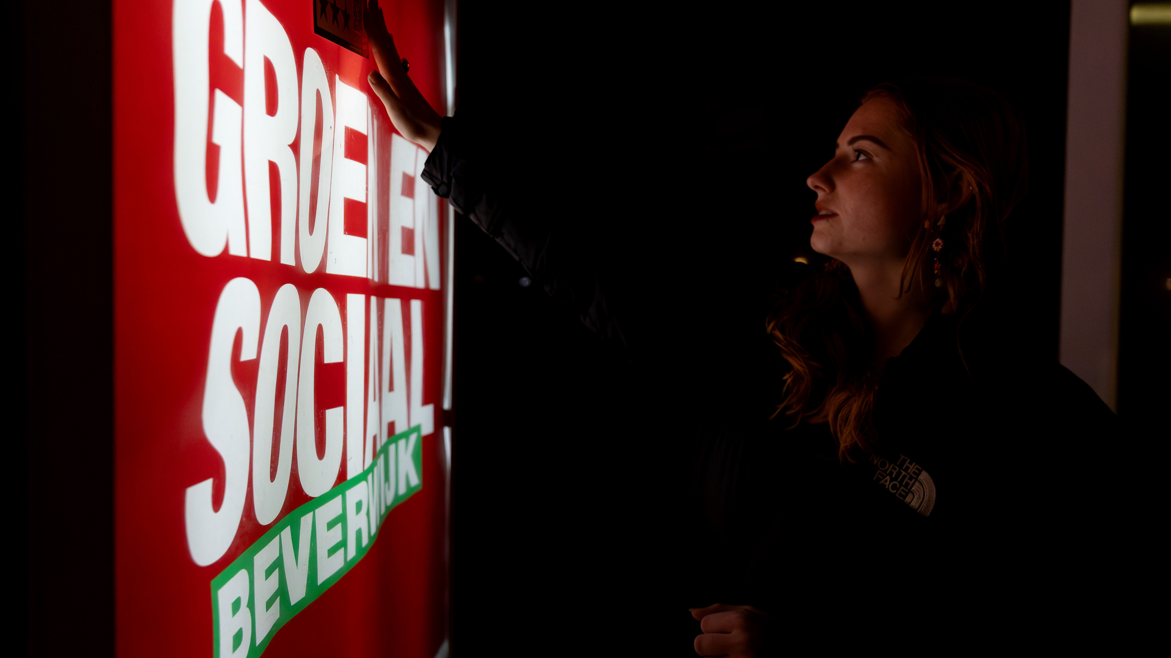 Hester and Sam paste stickers on election posters: How climate-conscious are Beverwijk’s local parties?