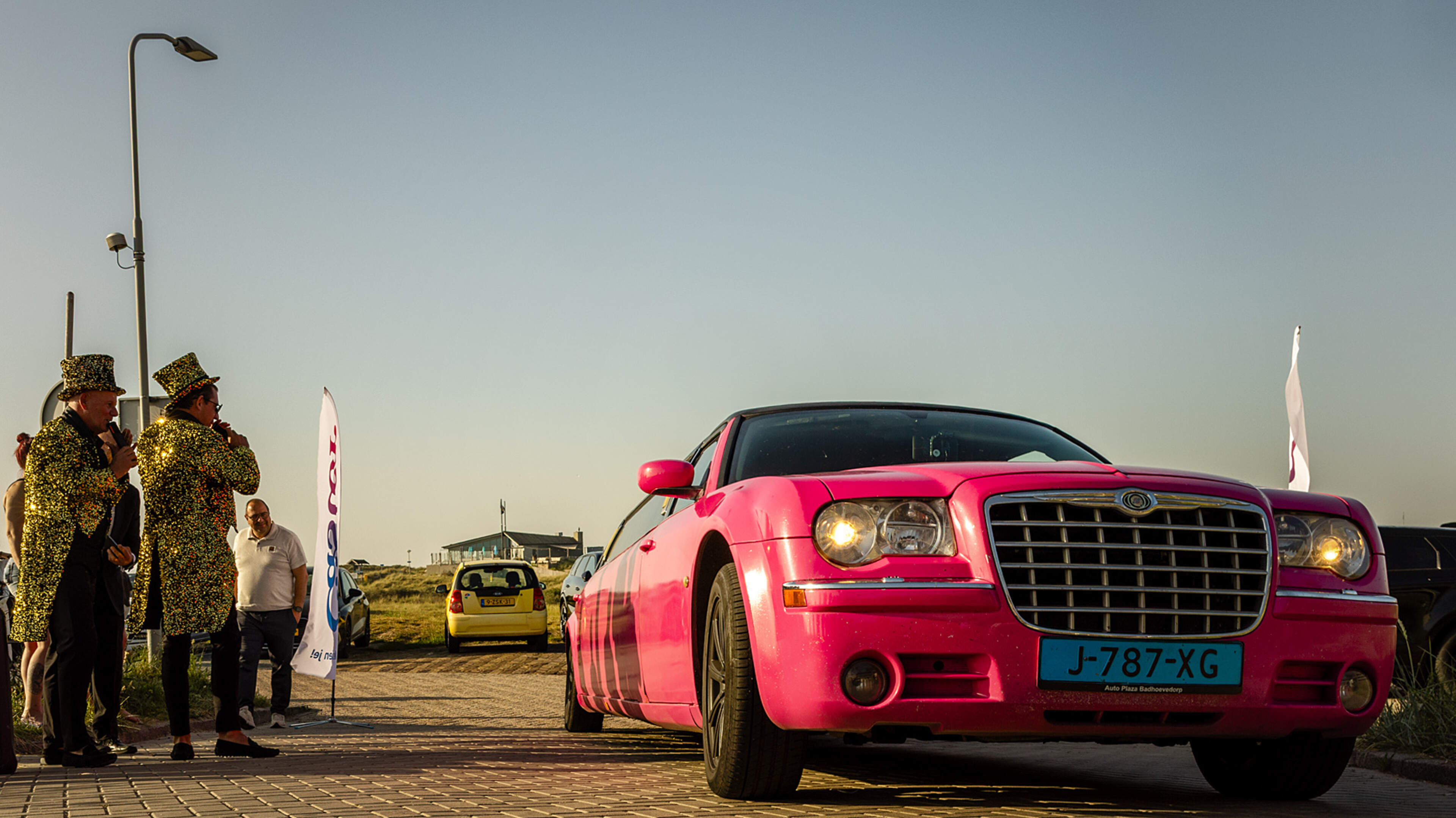 Limousines queue in Wijk aan Zee for Castor College graduation party. ‘Old cars have a certain charm’