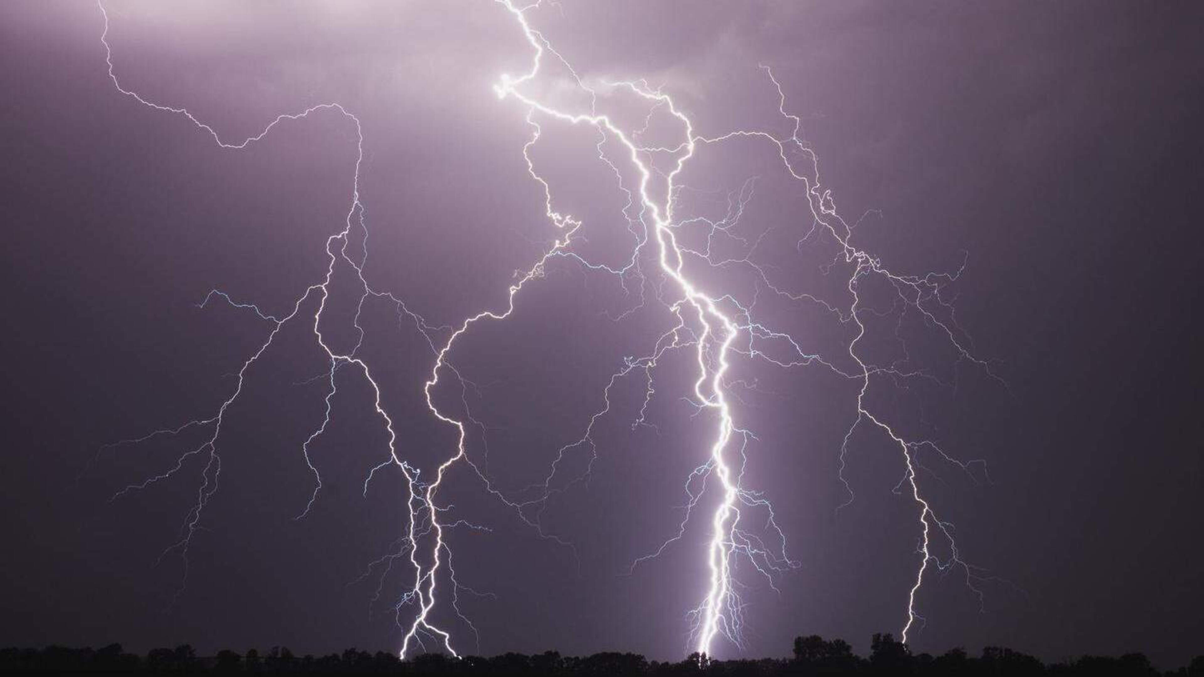 Massive thunderstorms sweep across the country: stunning images and heavy rain