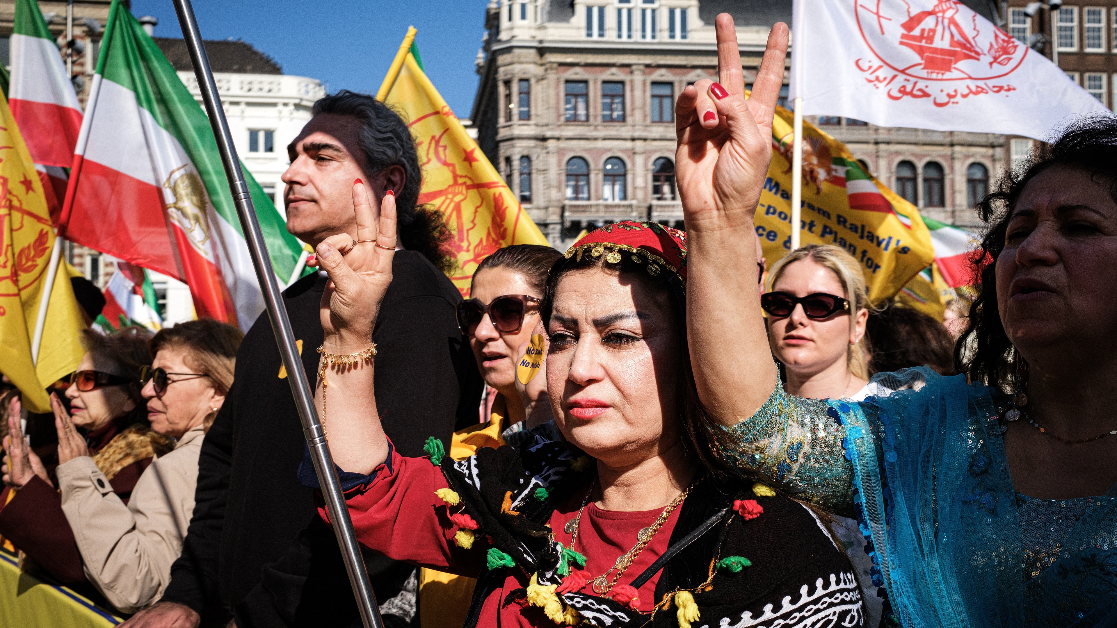 Iranians protest on Dam Square against the Iranian regime, the crown prince, and bombs