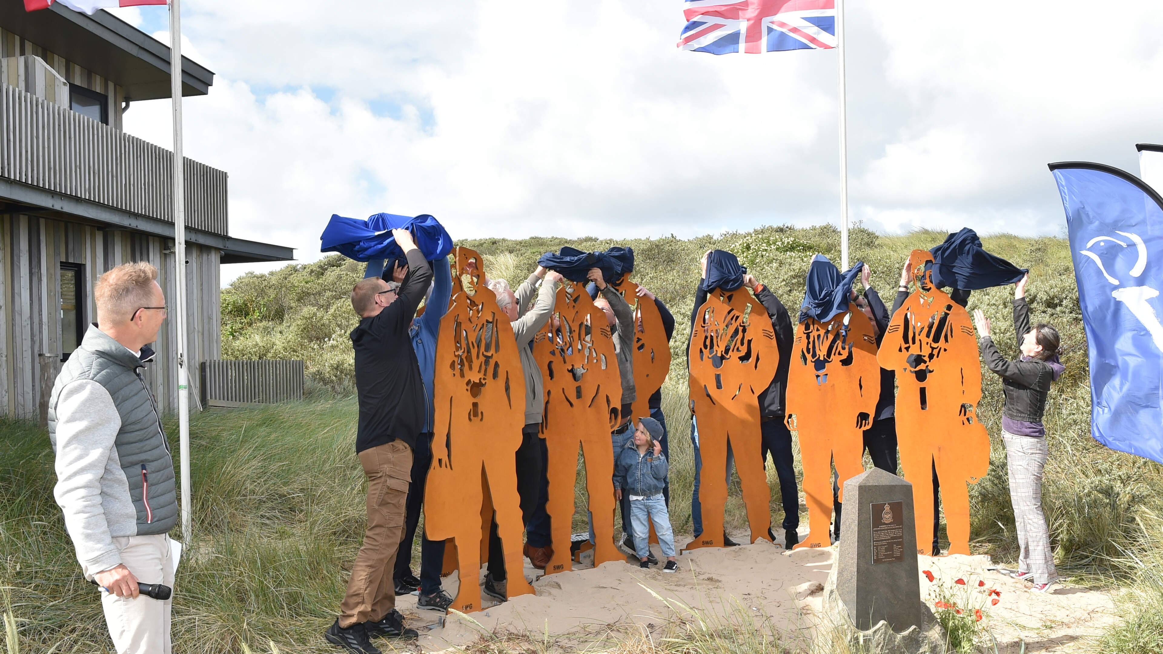 ‘Standing with Giants’ permanent at Castricum beach entrance. ‘You will no longer walk past these men carelessly’