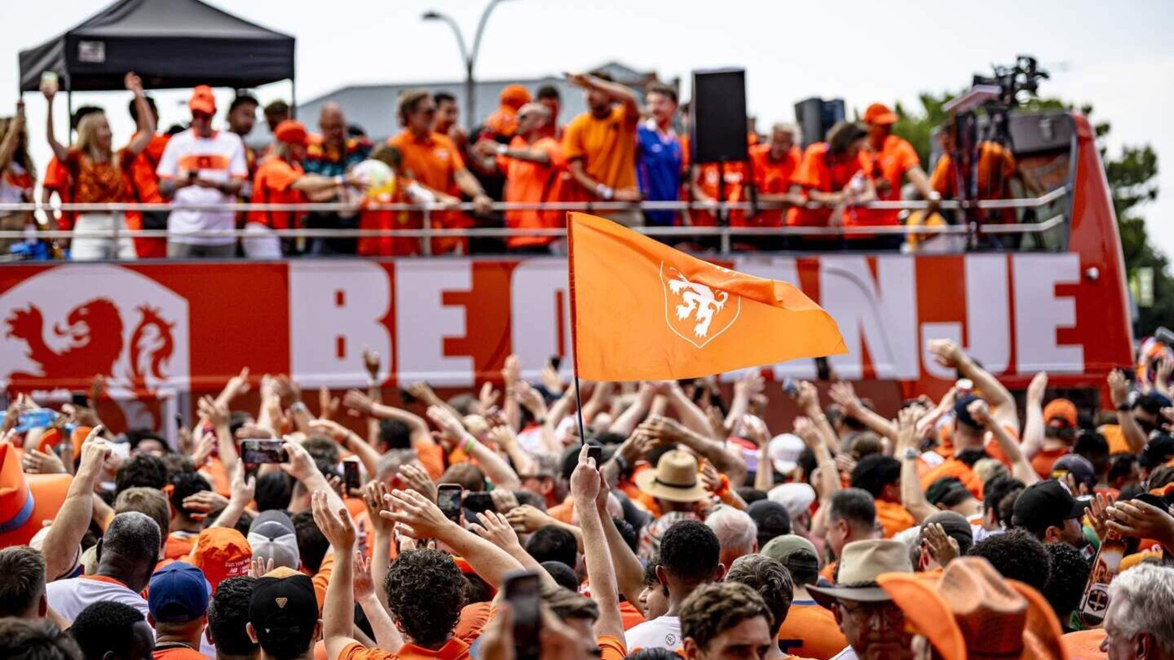 Dutch fans celebrate in a still-dry Kansas City