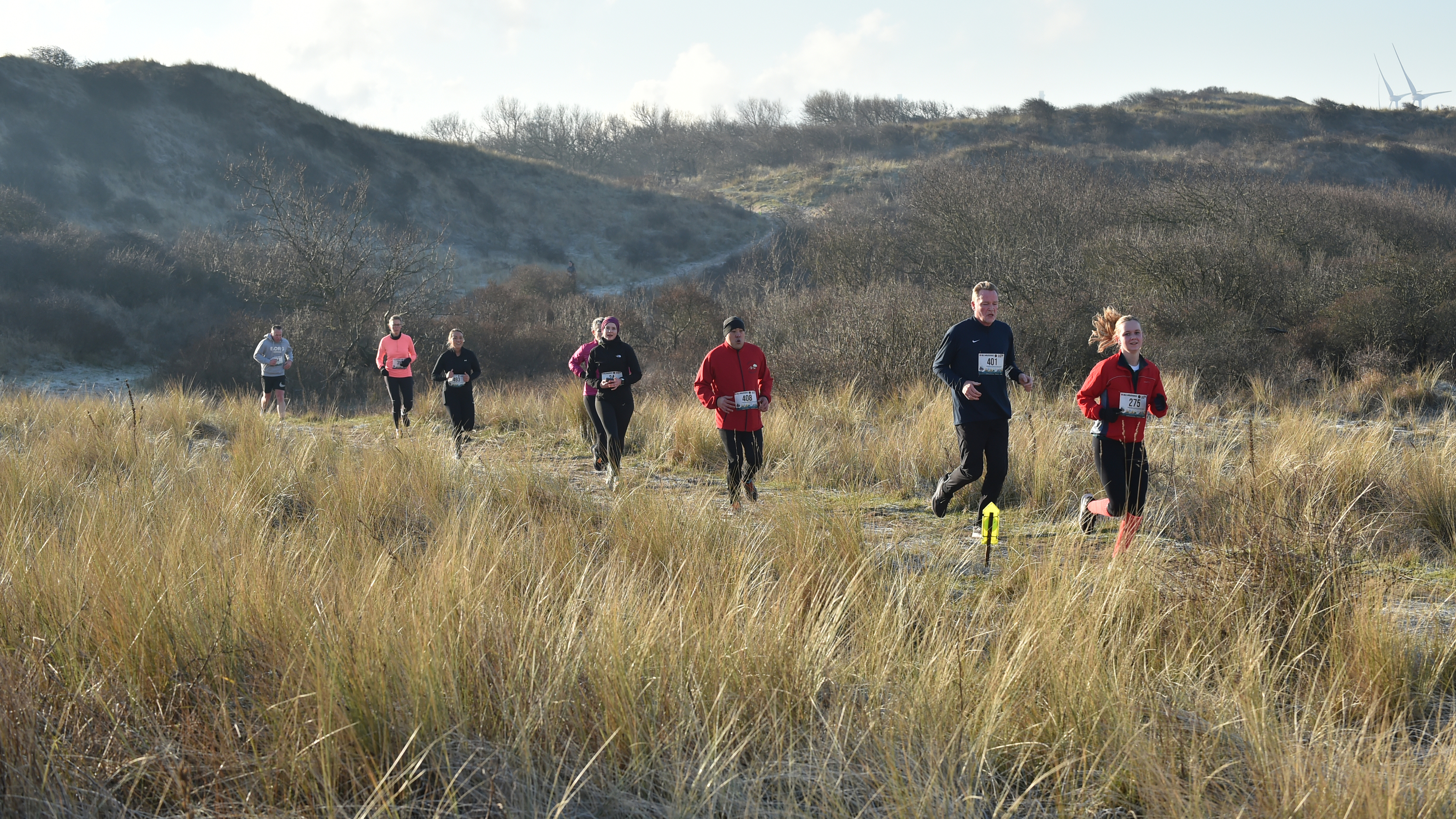 Bennet Ahrends, winnaar 5 kilometer: ’Ik doe vaker trails, maar deze was heerlijk zo door de duinen’