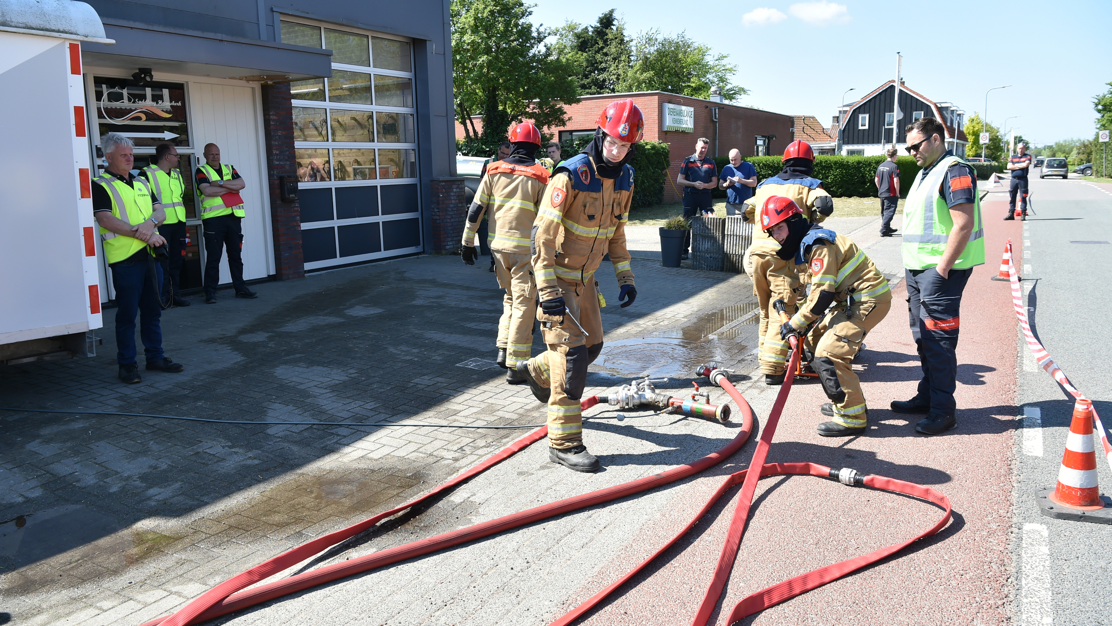 Youth fire brigades tackle simulated fires in Heemskerk to determine the best in the Netherlands