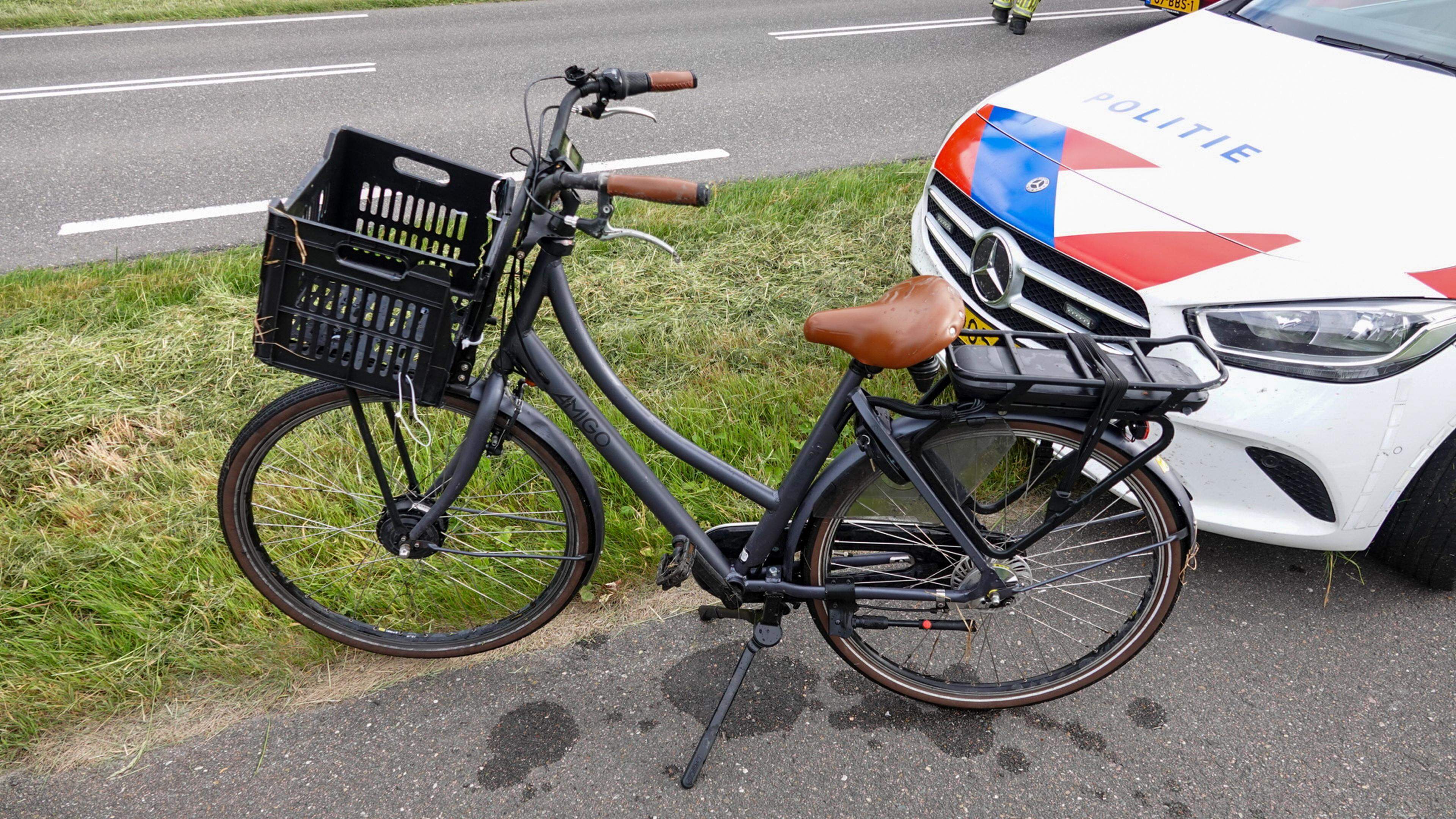 Fietser te water in Berkhout