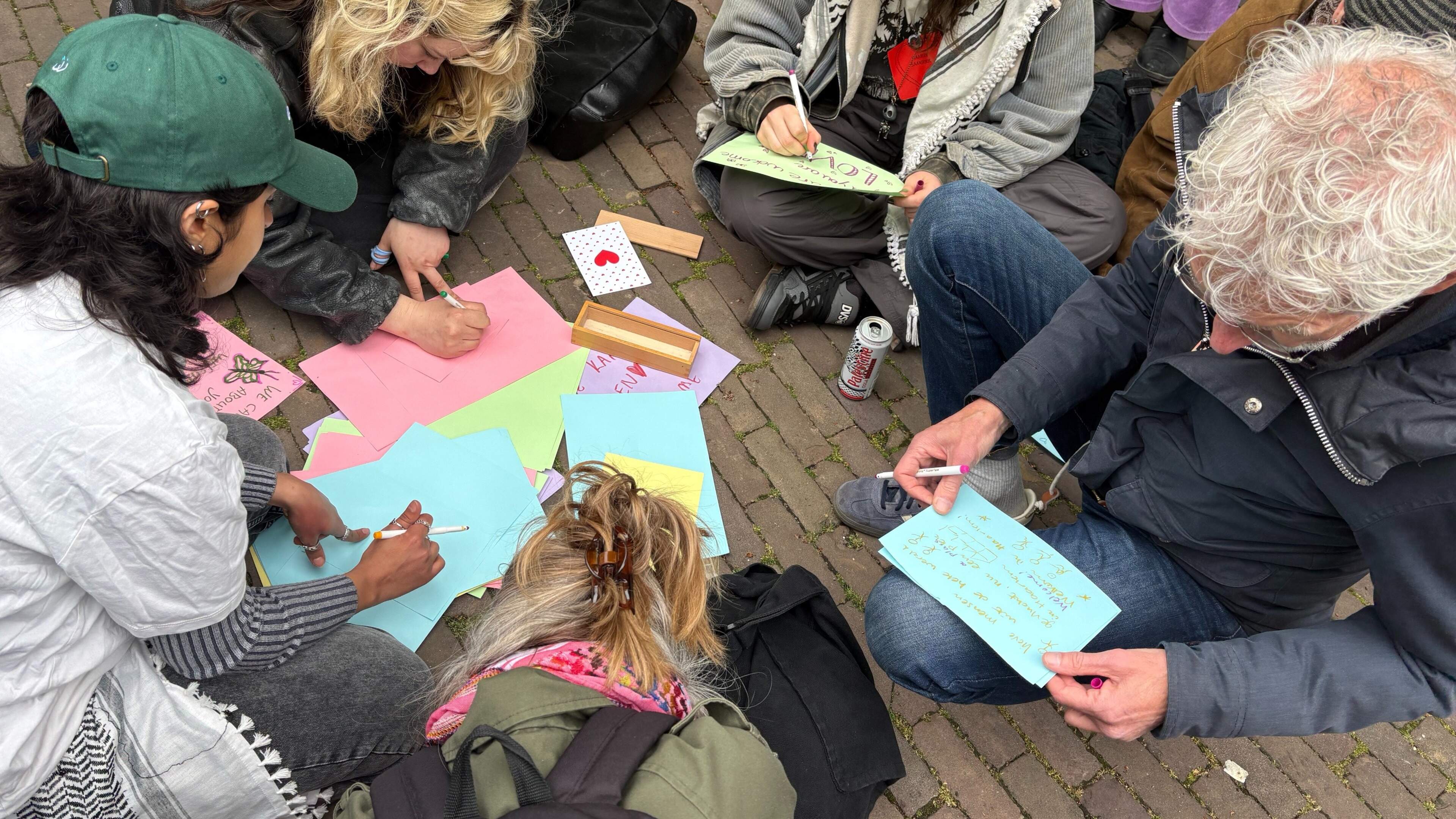Pro-refugee shelter protesters outnumber opponents: 'You just have to do something together; at home alone it starts to haunt you'