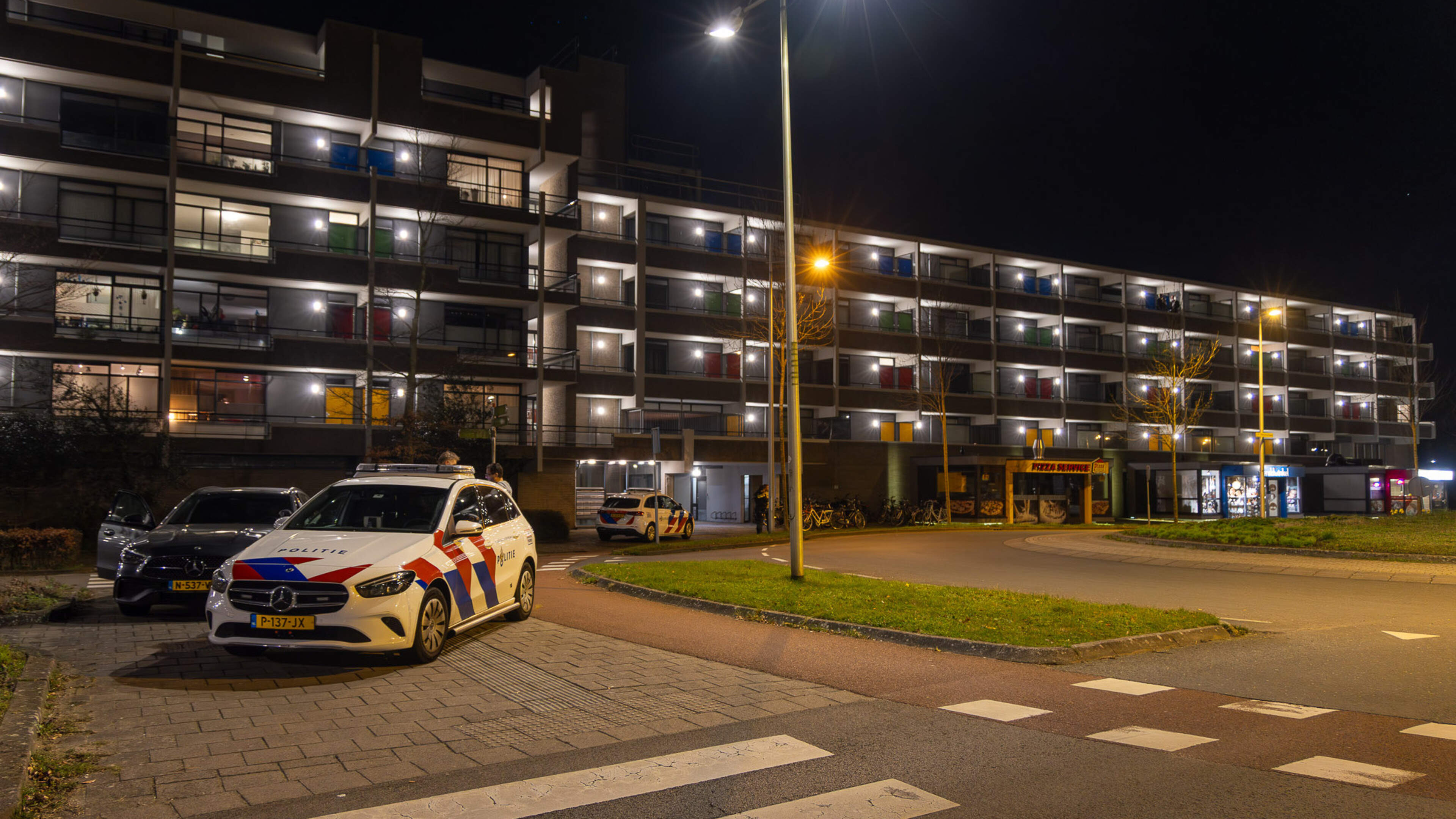 Nighttime street robbery in Castricum, officers wear bulletproof vests during search for suspect